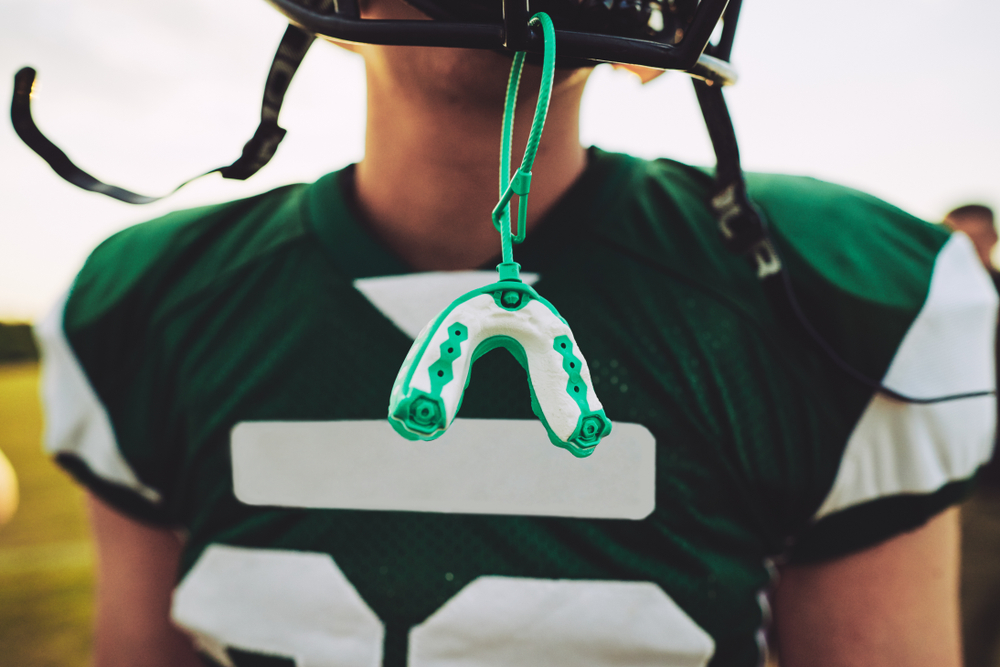 Closeup,Of,A,Mouthguard,Hanging,Off,The,Helmet,Of,An