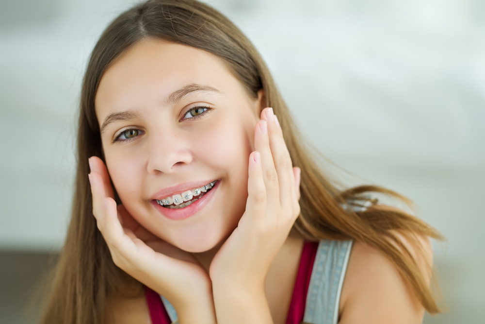 Portrait,Of,Cute,Kid,With,Dental,Braces,Smiling.