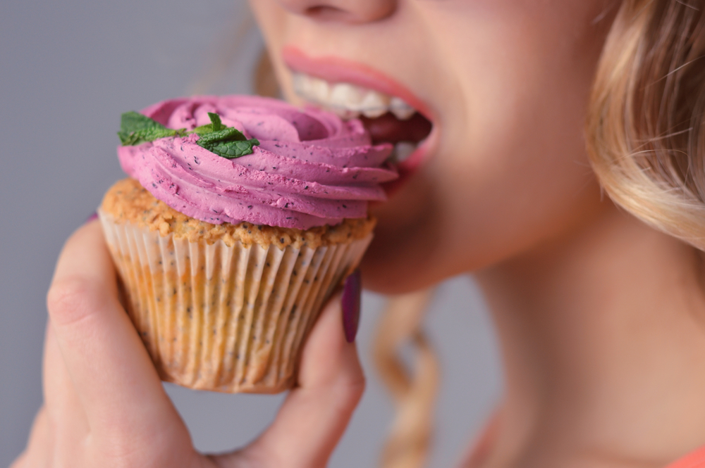 The,Girl,With,Braces,Eating,A,Cupcake.,Girl,And,Cake